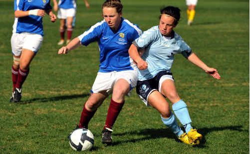 Brittany Whitfield, left, competes for the ball with NSW Metro’s Sharni Brown at the BCU International Stadium yesterday. Brittany Whitfield, left, competes for the ball with NSW Metro’s Sharni Brown at the BCU International Stadium yesterday.